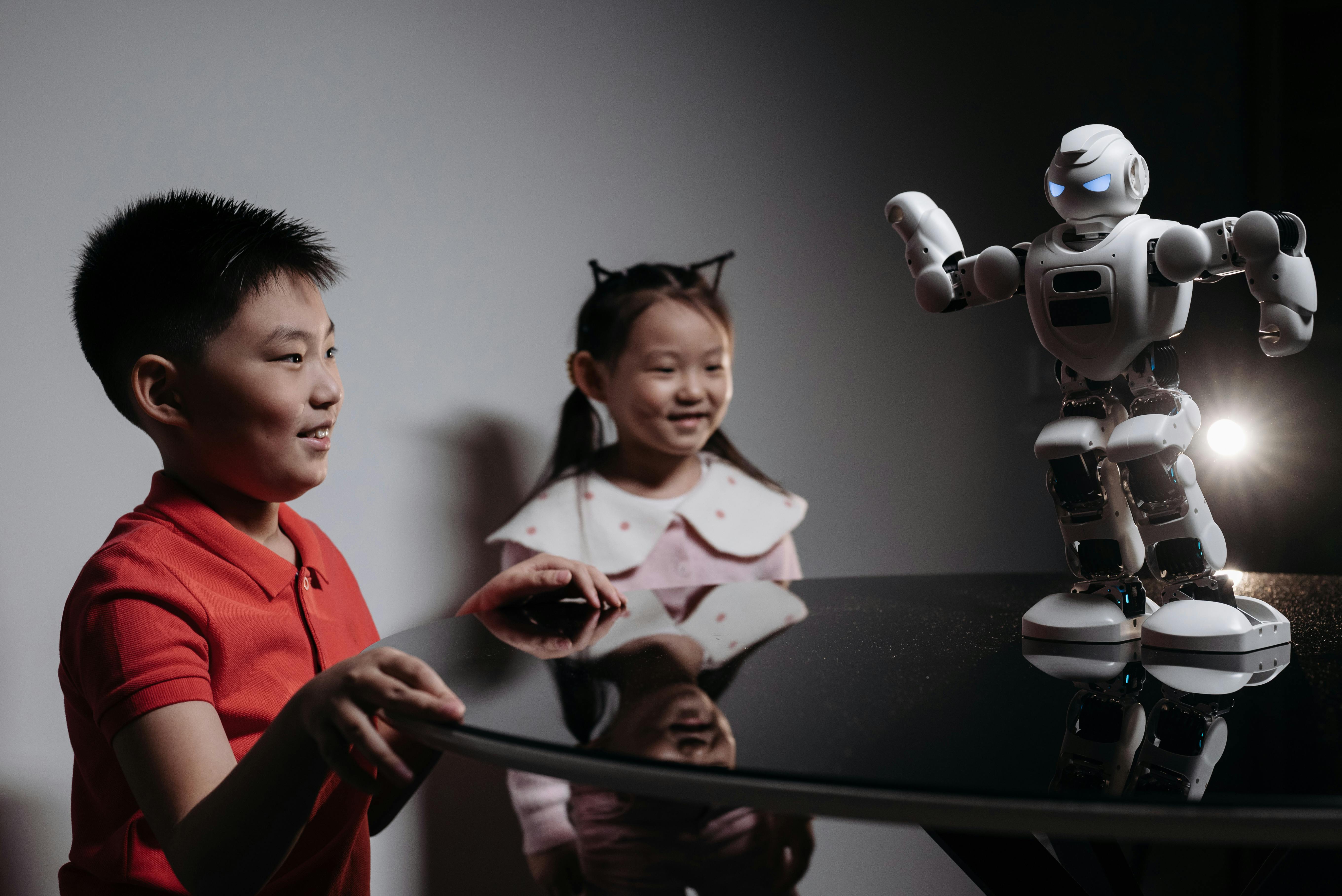Children playing with robot